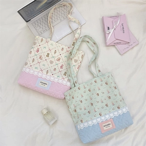 Flat lay of cute quilted tote bags with heart lace trim and lovely animal prints