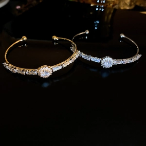 Luxurious gold and silver circular zircon open bangles with geometric diamond accents