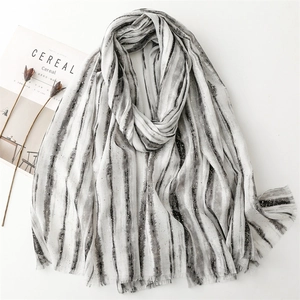 Artistic black and white striped cotton linen scarf with subtle gold sequins for women