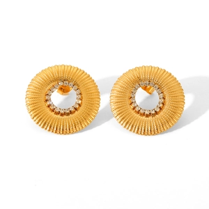 Detailed macro view of 18K gold plated radial earrings with sparkling white crystals