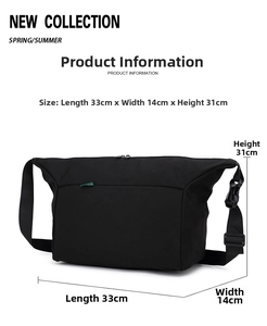 Guida alle dimensioni della borsa a tracolla in tela nera: misura 33cm x 14cm x 31cm