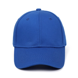 Close-up of royal blue baseball cap detailing twill fabric and stitching on brim