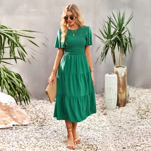 Short sleeve green maxi dress with shirred bodice and tiered skirt for summer vacation