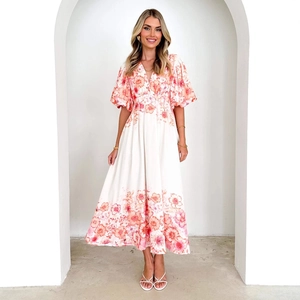 Floral V-neck puff sleeve midi dress with vibrant pink-orange patterns on cream base