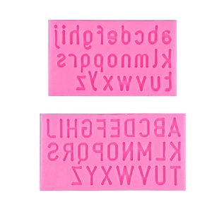 Pink silicone alphabet mold set with uppercase and lowercase letters for cake baking