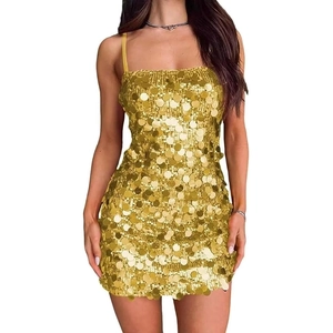 Detailed view of shimmering gold sequins and thin shoulder straps on the mini party dress