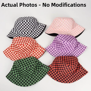 Detailed flat lay of checkered bucket hats in various colors with high-quality cotton texture