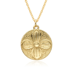 Vintage gold plated necklace with a sun face embossed flower pendant and dainty chain