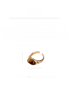 Detail view of gold-plated open ring with oval faux tiger eye stone and dimensions