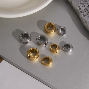 Polished stainless steel spring clip earrings in gold and silver, assorted sizes
