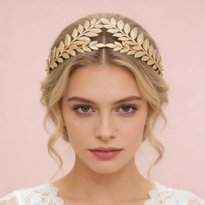 Elegant gold baroque leaf crown headband with detailed metal leaves for hair styling