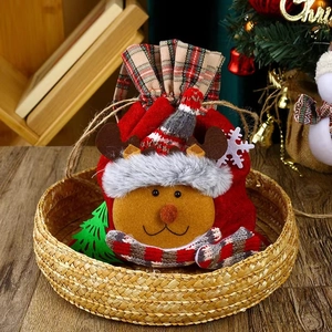 Detail of Christmas reindeer gift bag with plaid scarf and soft 3D plush fabric texture