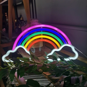 Rainbow and cloud LED neon sign emitting vibrant colorful light for wall decor