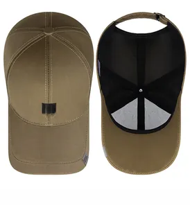 Detail view of khaki business cap with interior mesh support and adjustable metal buckle