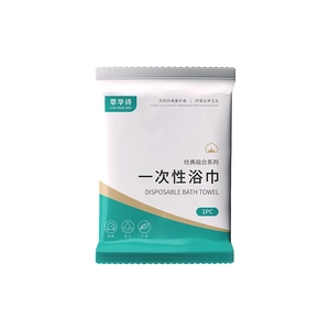 Extra thick disposable bath towel in individual packaging for hotel travel use
