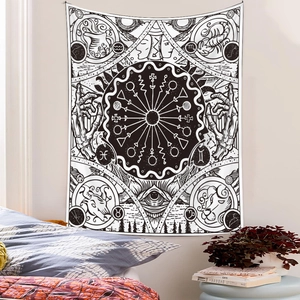 Detailed macro view of black and white zodiac wall tapestry with astrology symbols