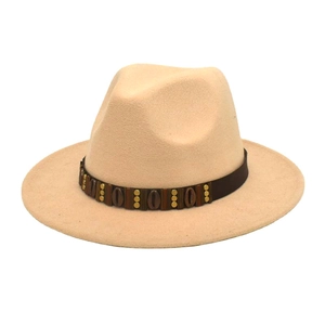 Close-up of beige wool fedora hat with brown leather band and gold metal accents