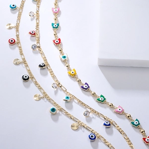 Gold plated devil eye necklaces with colorful butterfly charms and zircons in a row