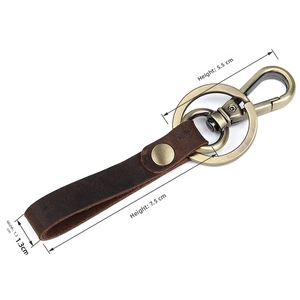 Retro brown leather keychain dimensions showing 7.5cm height and 1.3cm width detail