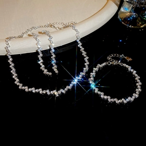 Detailed view of luxury zircon tassel jewelry set with necklace bracelet and earrings