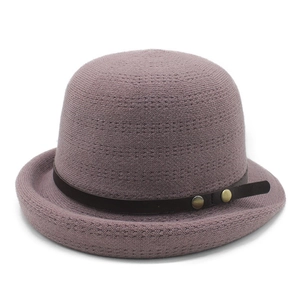 Women's knitted bucket hat with faux leather strap and bronze buttons in dusty purple