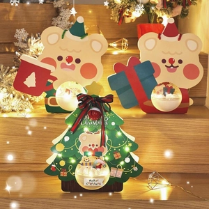 Lighted Christmas tree and bear paper gift box decorations for holiday cake packaging