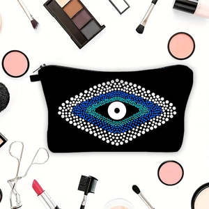 Portable evil eye printed makeup bag with zipper closure and professional cosmetics