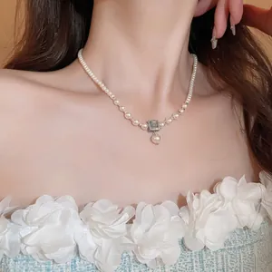 French pearl necklace with gold-plated square blue stone pendant and waterdrop pearl