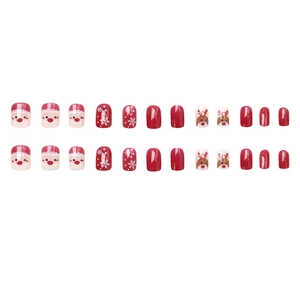 Christmas reindeer press-on nails set with red glossy finish and snowflake patterns
