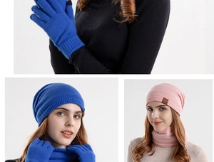 Detail of winter knitted hat scarf and gloves set showing touch-screen fingertips