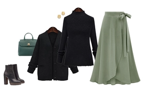 Flat lay of women's autumn outfit with green wrap skirt, black cardigan and boots