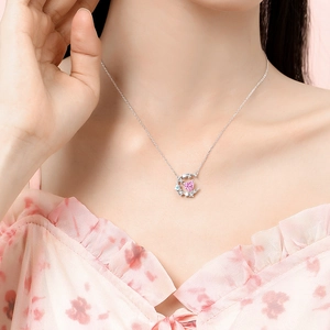 925 Sterling silver necklace with moon pendant and pink heart gemstone on neck model