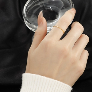 Minimalist 18k gold plated stainless steel ring featuring a fine textured beaded finish