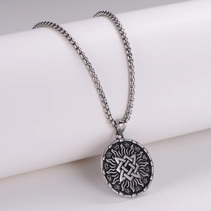 Vintage silver Viking pendant necklace with Celtic knot and sunburst on a box chain