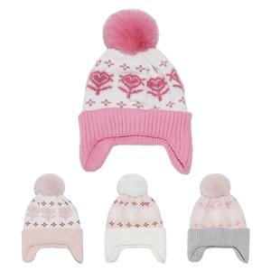 Detail of girls winter knit hat with pompom featuring floral patterns and earflaps