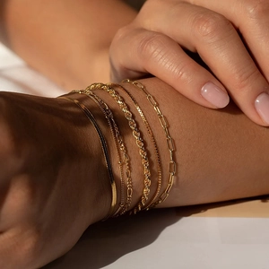 Bohemian gold chain bracelet set for women featuring snake and figaro chain styles
