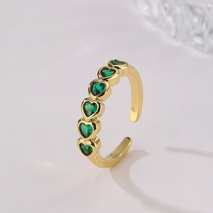 Adjustable 18K gold plated copper ring featuring five green heart-shaped zircon stones