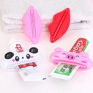 Cartoon animal tube squeezers for toothpaste and cleansers in panda and pig designs