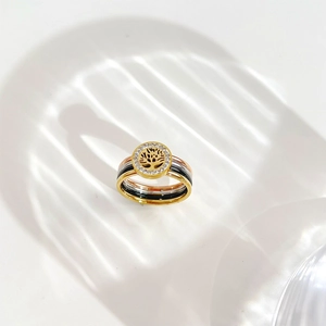 Chic layered Tree of Life ring with diamonds in gold, black, silver, and rose gold