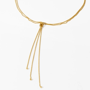Layered gold Y-shaped knot tassel necklace with delicate cauliflower chain for women