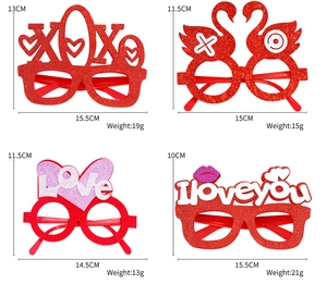 Set of four red and pink glitter Valentine's Day party glasses with XOXO and Love designs
