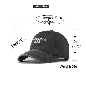 Detailed view of black washed baseball cap with white embroidery and size specifications