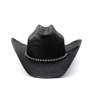 Detailed view of black woven straw cowboy hat with a braided band and upturned brim