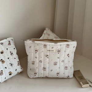 Quilted cotton cosmetic bag with cute animal prints and a Simple Wish fabric label