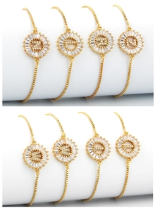 Adjustable gold bracelet with circular micro-paved zircon initial letter charm detail