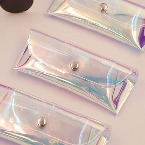 Sleek holographic PVC sunglasses pouch with silver metal snap closure detail