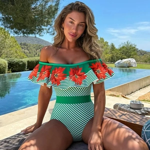 Off-shoulder one-piece swimsuit with green tropical floral print and ruffle details
