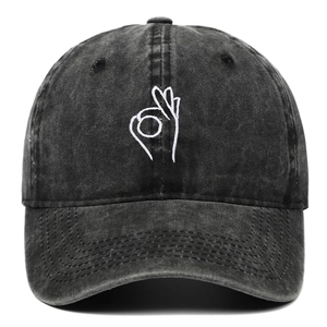 Detailed embroidery of OK hand sign on washed grey denim retro baseball cap