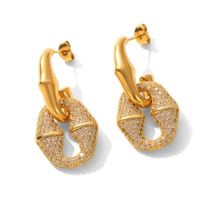 Detail of 18k gold plated hoop earrings featuring sparkling pave crystal oval links