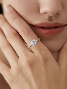 Close-up of S925 silver moissanite halo ring featuring a square cut center stone